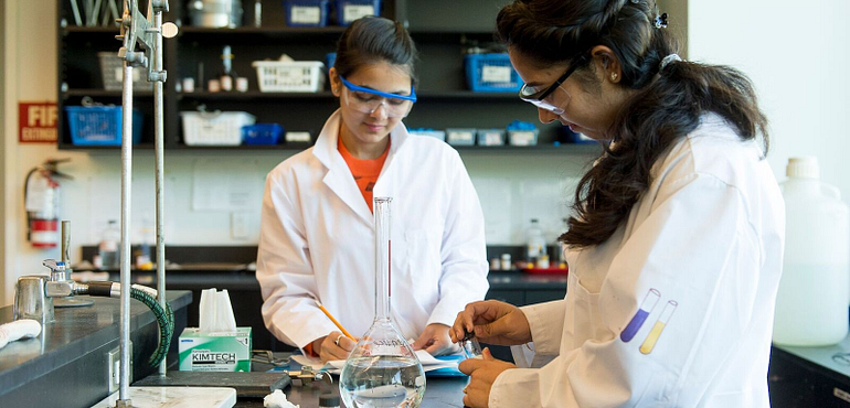 two students in a lab