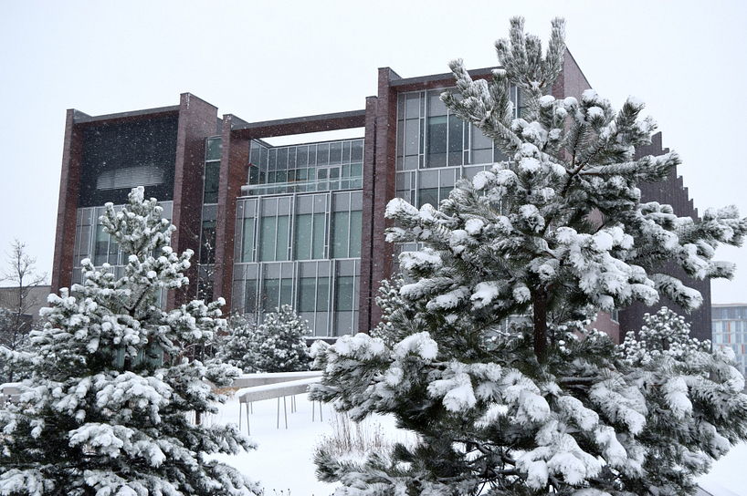 progress campus library building covered with snow