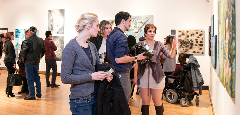 people in an art gallery