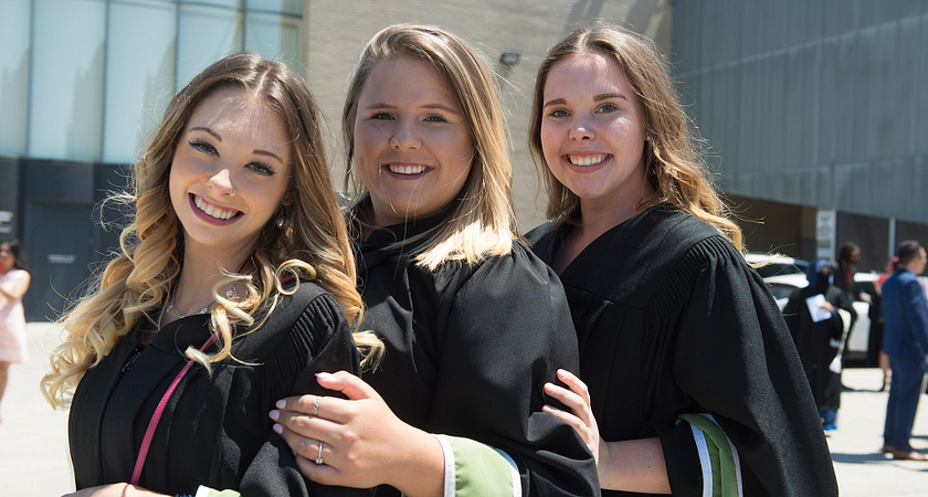 Picture of Centennial College students pose for a picture during convocation