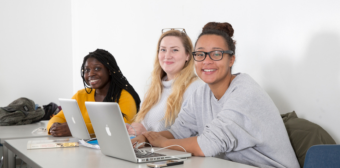 picture of Centennial College International Education students in class smiling