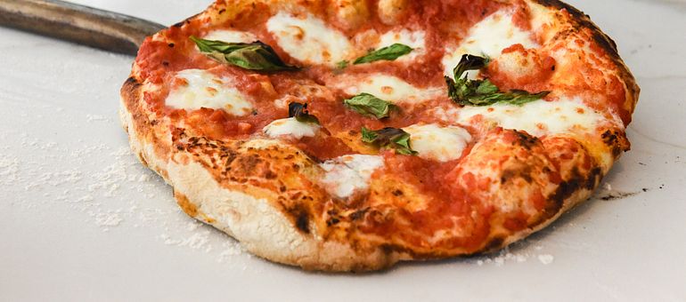 Pizza According to the World Image