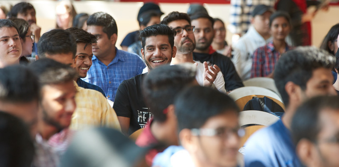 picture of Centennial College International Students smiling in a crowd at orientation