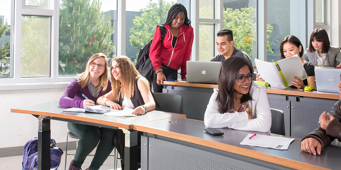 picture of Centennial College students participating in a focus group in a classroom