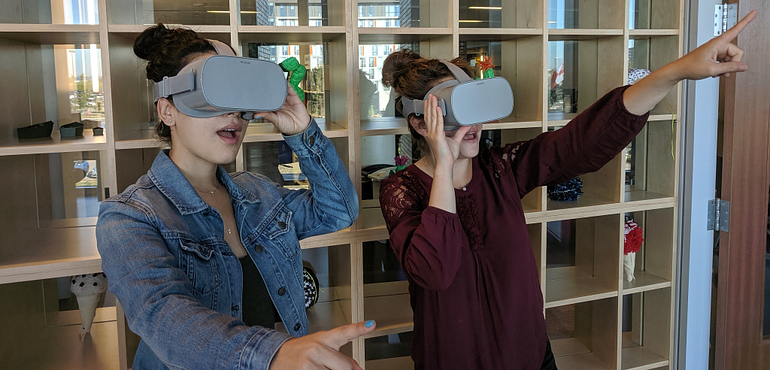 person wearing virtual reality headsets