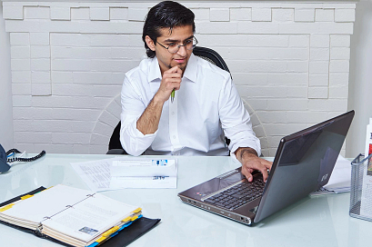 student working at a laptop