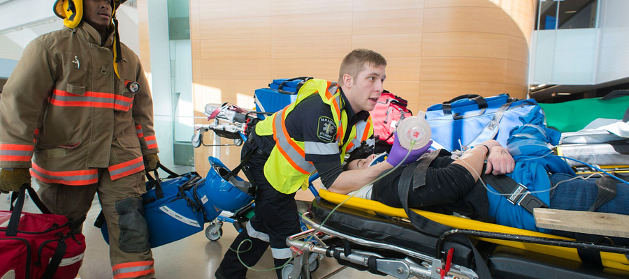 Centennial College paramedic and pre-service firefighter students participating in the mock disaster