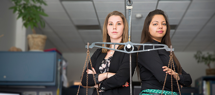 Two female law students in their office