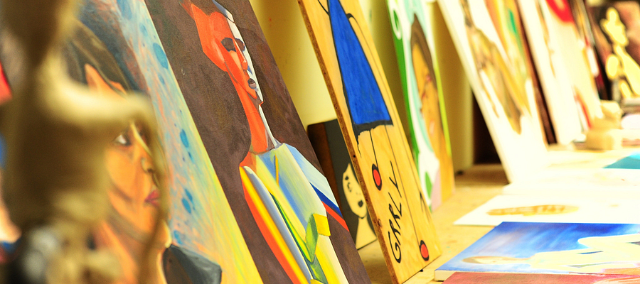 A picture of a variety of art work displayed on a table