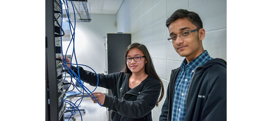 Eulysis and Reham working on a networking activity