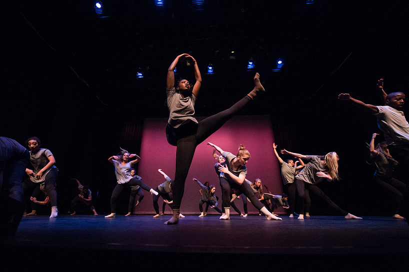 Students dancing on stage