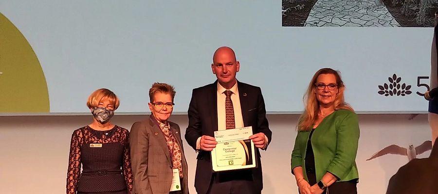 Dr. Craig Stephenson, Centennial College President and CEO collecting CICan Award in Halifax