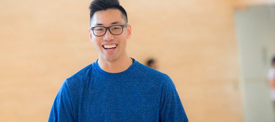 A Centennial College student smiling in the Progress Campus gym
