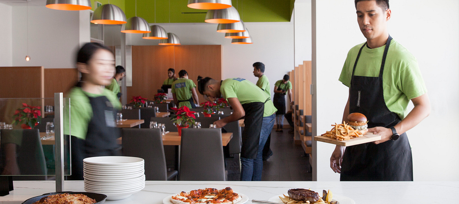 Hospitality students serving in The Local Cafe and Restaurant
