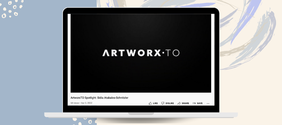 An ArtworxTO YouTube video playing on a laptop