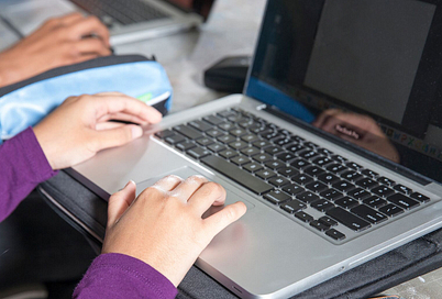 Student working on a laptop