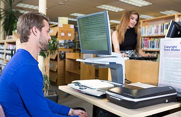 student using a scanner