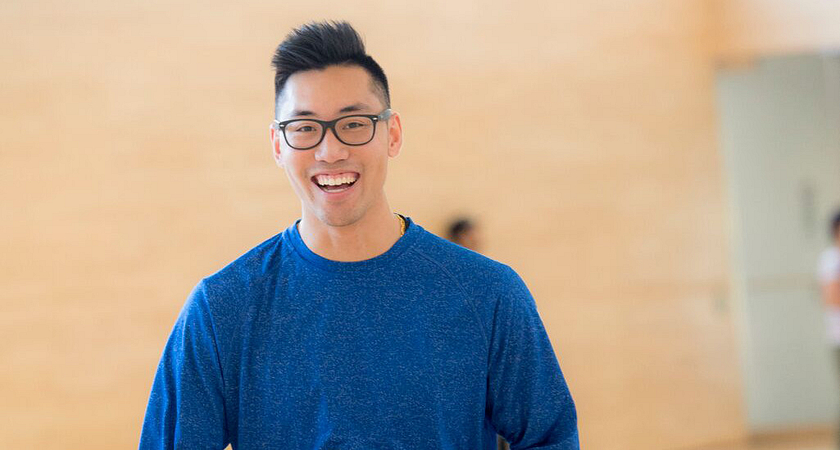 centennial college student smiling while participating in a recreational activity in a gym