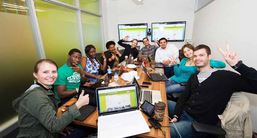 picture of the international education team in a meeting room during a virtual fair live chat event